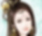 Woman wearing Hua Dian the decoration between eyebrows