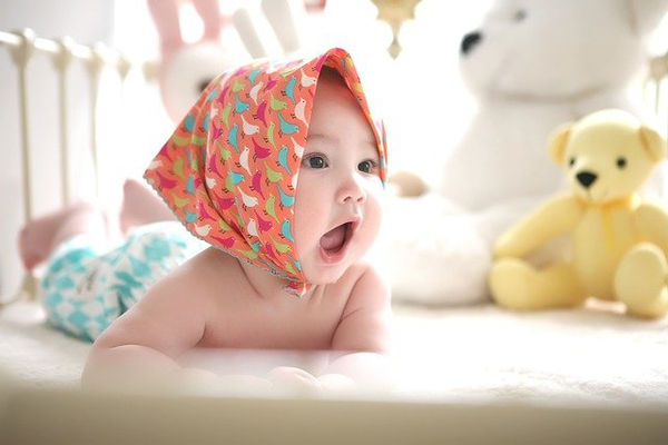 baby wearing scarf