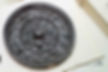 Unearthed Copper Mirror Decorated with Mythical Animals and Grape Patterns