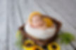 Cute newborn baby and flowers