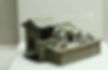 Pottery Figurine A Farmer Playing Flute (Xiao) in Sheepfold of the Eastern Han Dynasty (25 — 220)